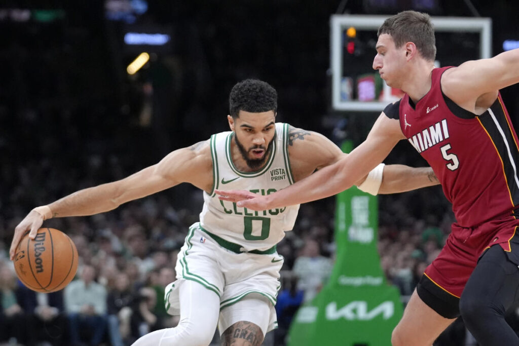 Jayson Tatum triple-double, 3s lead Celtics past Butler-less Heat 114-94 in playoff opener