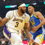 Lakers star Anthony Davis leaves Christmas win vs. Warriors early after rolling ankle