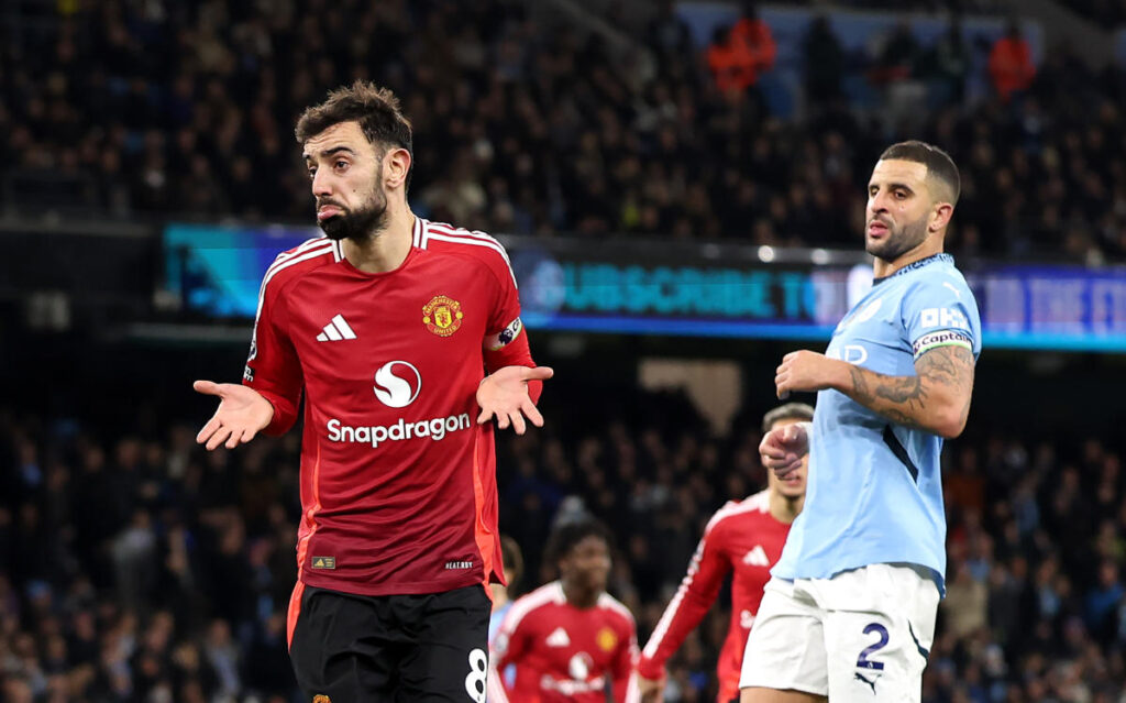 Manchester United stuns Man City with last-minute 2-1 win to take Manchester Derby