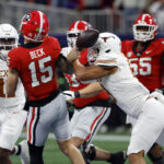 Georgia claims SEC championship in overtime against Texas, but loses Carson Beck to injury