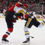 Rookie Defenseman Injured, Devils Shut Out Penguins, 3-0