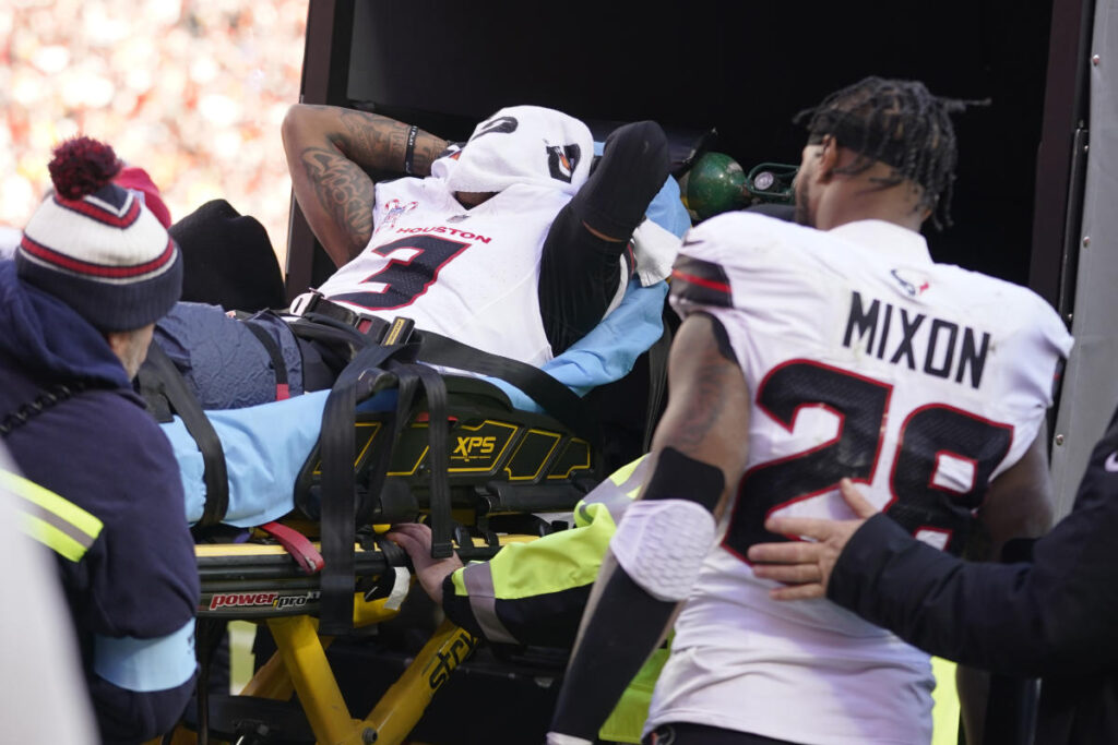 Texans WR Tank Dell suffers dislocated knee cap as he makes TD catch, leaving C.J. Stroud in tears