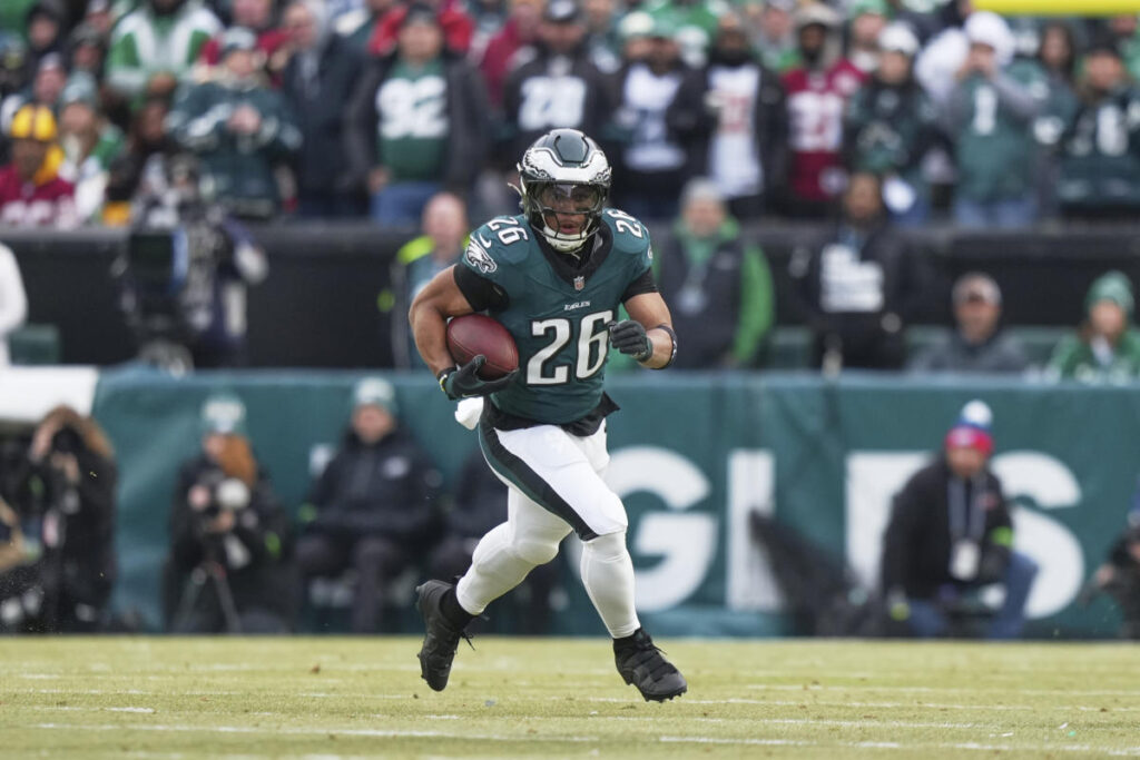 NFC championship: Saquon Barkley’s 1st 2 carries go for Eagles touchdowns, including another spectacular long run