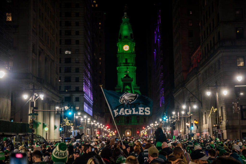 Eagles fans climb poles, dance in the streets to celebrate team’s trip to Super Bowl 59