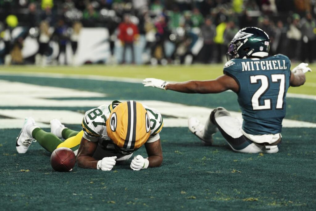 Packers WR Romeo Doubs leaves playoff game vs. Eagles with apparent head injury weeks after suffering concussion