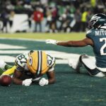 Packers WR Romeo Doubs leaves playoff game vs. Eagles with apparent head injury weeks after suffering concussion