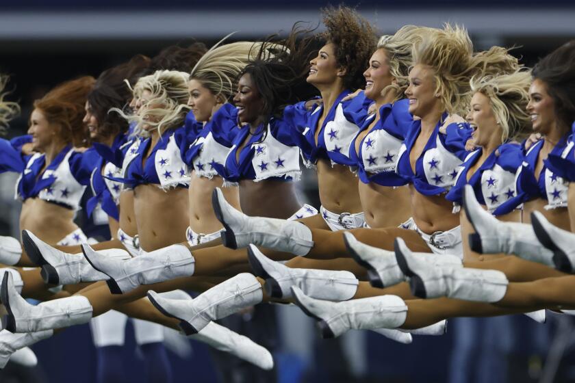 Do cheerleaders need to wear helmets? Ball hits Cowboys cheerleader in head, knocks her down