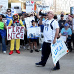 Fans protest Luka Dončić trade outside Mavericks arena, as Anthony Davis makes debut in Dallas