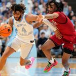 RJ Davis scores 21 to help North Carolina beat NC State 97-73