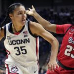 Azzi Fudd’s career-high 34 points and eight 3-pointers powers No. 7 UConn past visiting St. John’s