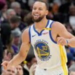 Curry makes history as Warriors beat Kings