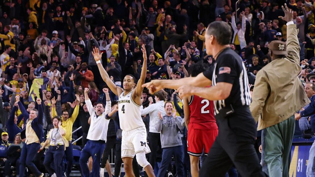 No. 15 Michigan beats Rutgers 84-82 on Burnett’s 3-pointer at buzzer, moves into 1st-place tie