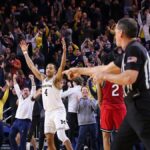 No. 15 Michigan beats Rutgers 84-82 on Burnett’s 3-pointer at buzzer, moves into 1st-place tie