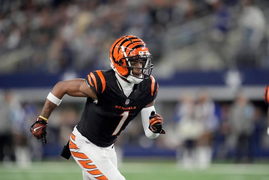 Chase, Higgins reach extensions with Bengals. AP source says Chase will be NFL’s highest-paid non-QB