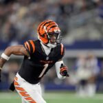 Chase, Higgins reach extensions with Bengals. AP source says Chase will be NFL’s highest-paid non-QB