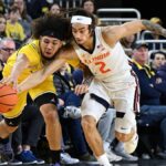 Tre White leads Illinois to a 93-73 rout of No. 15 Michigan