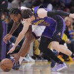 Austin Reaves leaves Lakers vs. Clippers after sustaining calf injury