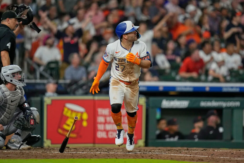 Altuve and Walker each hit a 2-run homer to help the Astros beat the Tigers 8-5