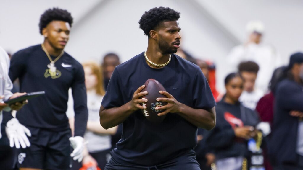 Players debate Shedeur Sanders’s habit of patting the ball