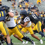 West Virginia is building a good mix in the backfield