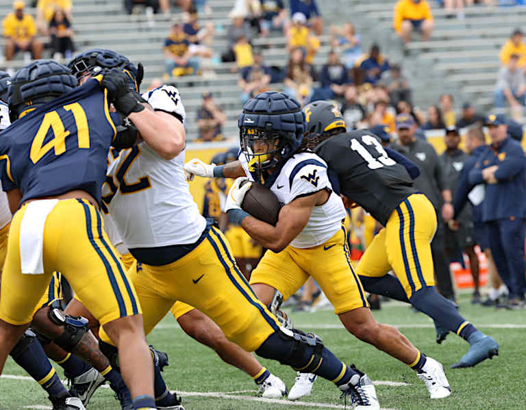 West Virginia is building a good mix in the backfield