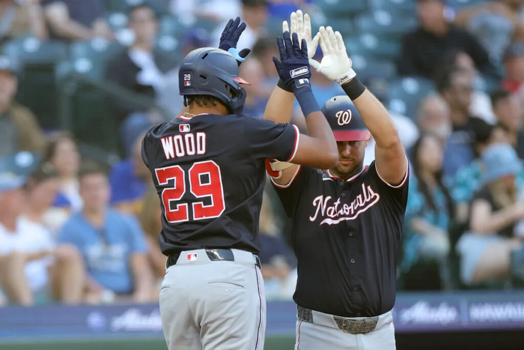 Hassell hits 1st major league homer and Nationals rout Mariners 9-0