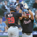 Hassell hits 1st major league homer and Nationals rout Mariners 9-0