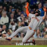 Giants score 9 runs in the 11th inning to beat the Cubs 14-5