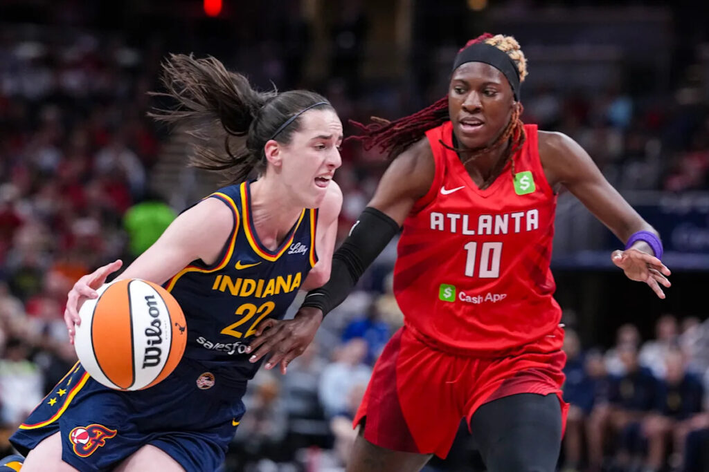 Caitlin Clark makes more history, but Fever take first loss of season to new-look Dream