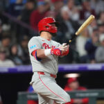 Kyle Schwarber, Bryce Harper help Phillies beat Rockies 7-4 for 5th straight victory