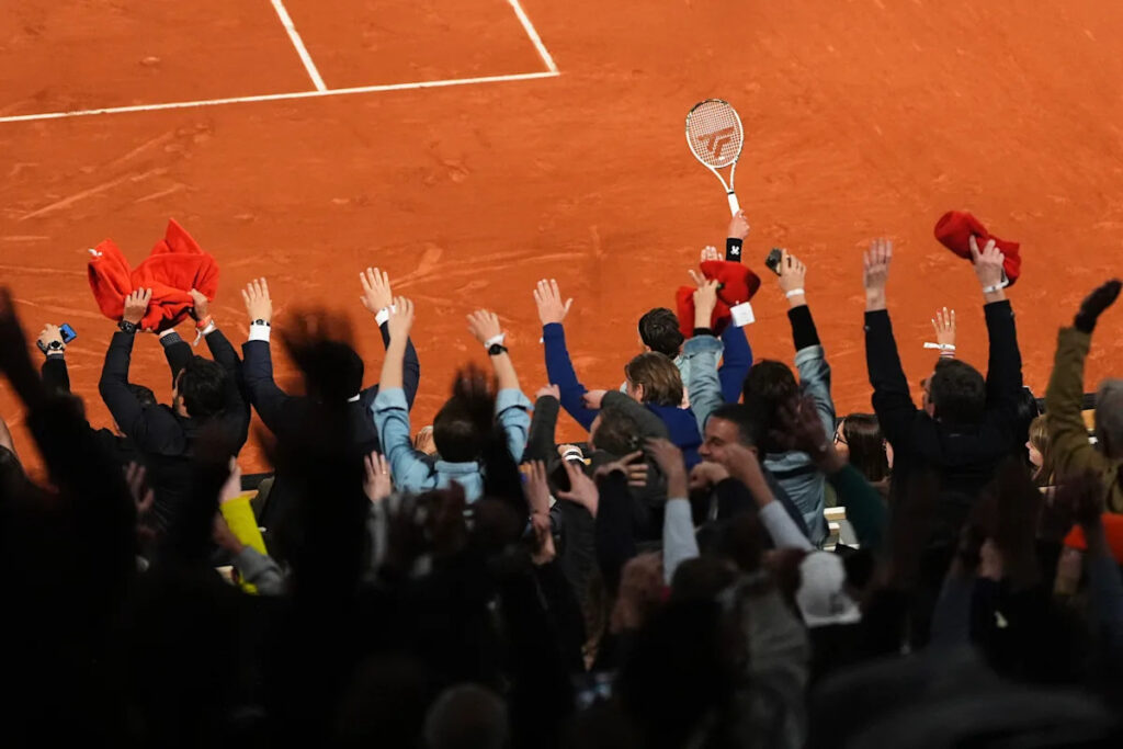 Opponents of French players at the French Open deal with insults and whistling and, yes, even gum