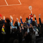 Opponents of French players at the French Open deal with insults and whistling and, yes, even gum