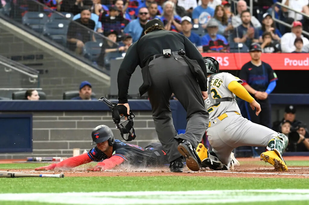Clement and Barger homer as Blue Jays win 11-7, move over .500